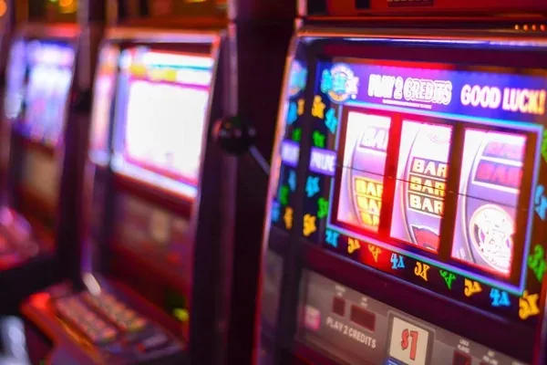 Rows of illuminated slot machines